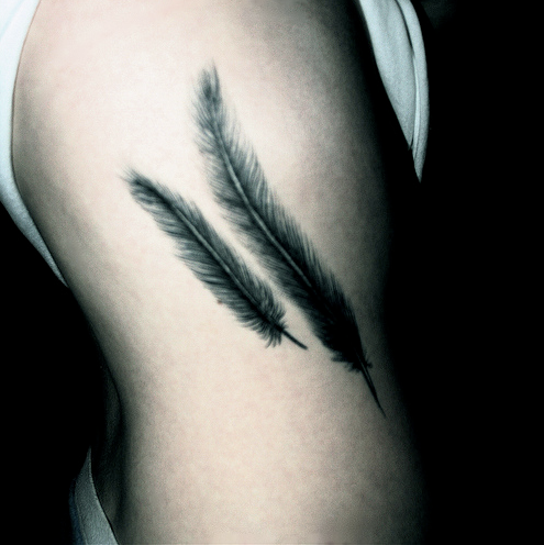 Tattoos Meaning on Feather Tattoos Tattoologist Rodeo Magazine